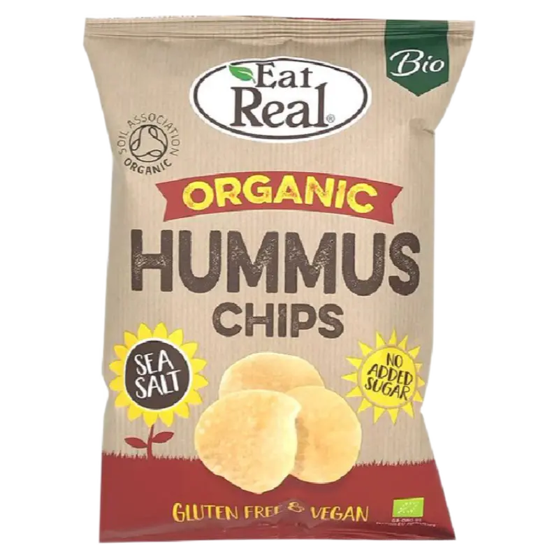 A bag of Eat Real Organic Hummus Chips, featuring a beige background with red, yellow, and green accents, and showing three golden-beige chips on the front.