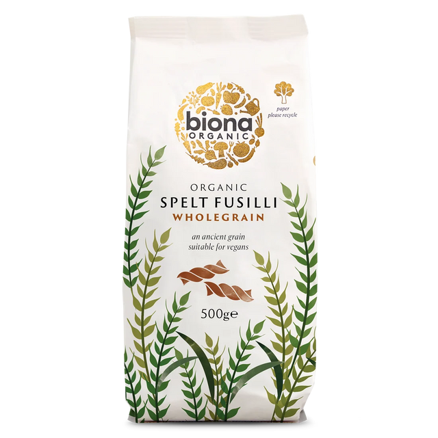 A 500g bag of Biona Organic Spelt Fusilli Wholegrain pasta on a solid white background. The packaging is off-white with a gold circular logo, green and olive botanical illustrations, and brown pasta pieces shown in the center.