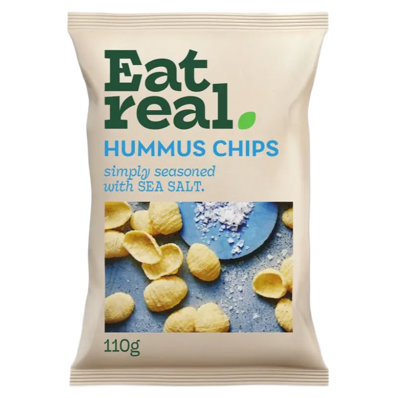 A 110g bag of Eat Real Hummus Chips, simply seasoned with sea salt. The packaging is a warm cream color with green and blue text, and a photo of golden-brown chip curls on a blue plate.