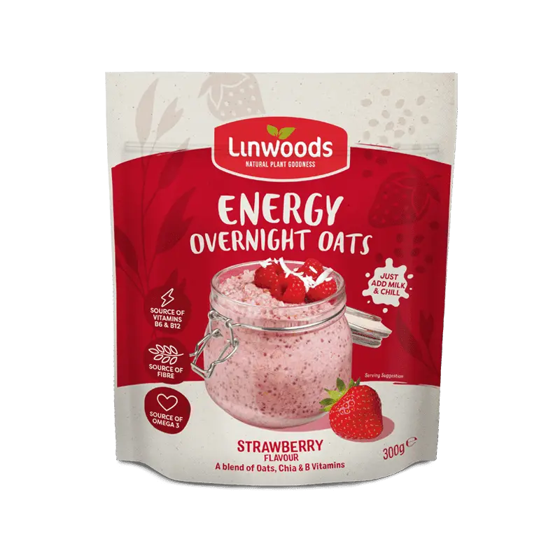 A 300g pouch of Linwoods Energy Overnight Oats in Strawberry flavor, featuring a red and white package design with an illustration of a strawberry parfait in a glass jar.