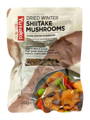 A 30g pouch of Yutaka Dried Winter Shiitake Mushrooms, featuring a beige and brown design with a clear window showing the dried mushrooms inside and a serving suggestion of cooked mushrooms on the front.
